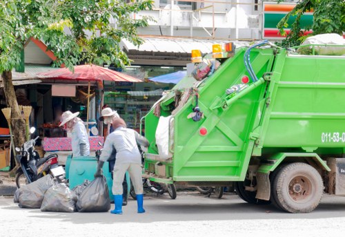 Crew conducting a site risk assessment before waste collection